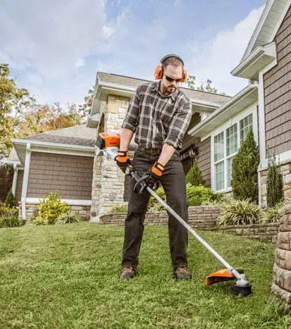 STIHL battery-powered string trimmer in use